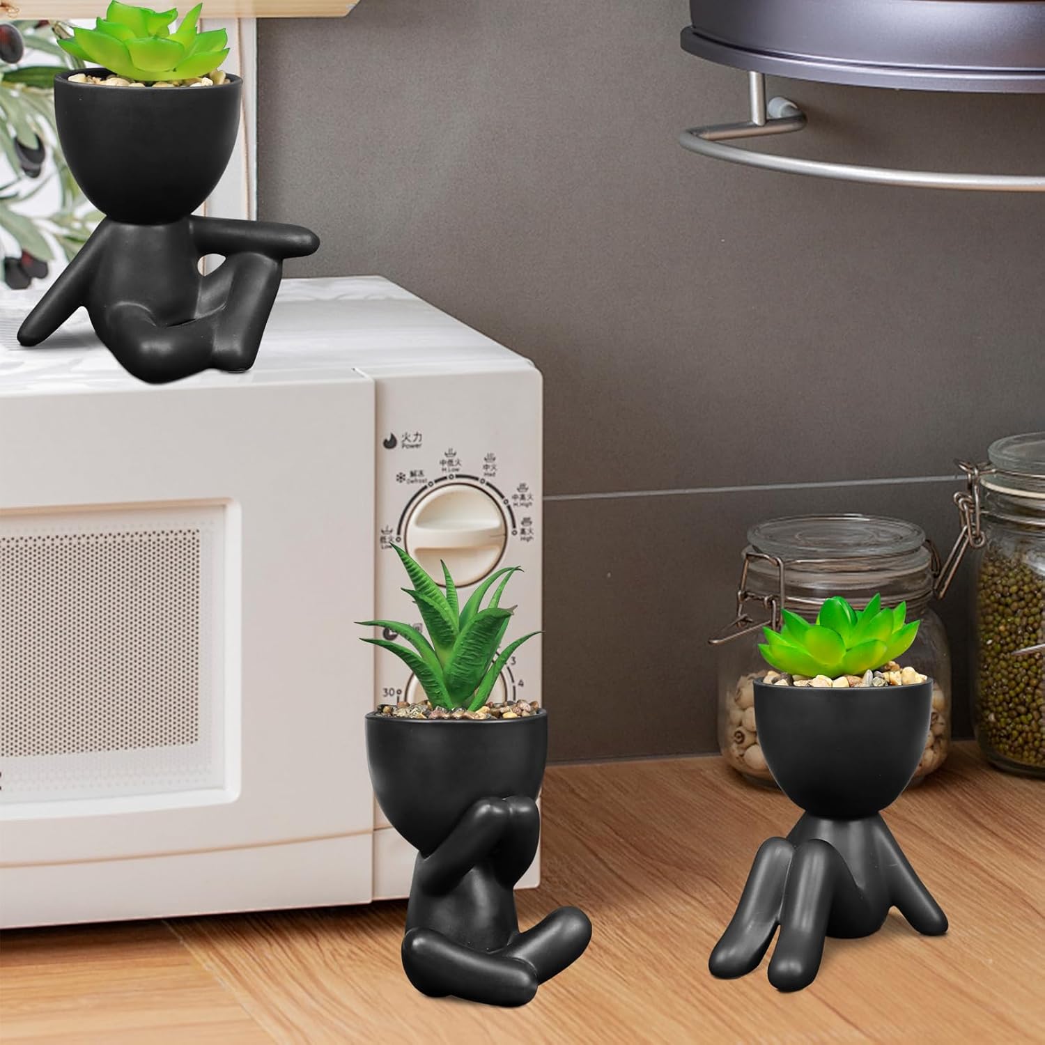 Pack of 4 Matte Black Faux Plants with Human Shaped Pots